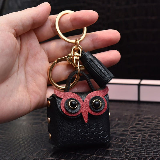 Creative Leather Owl Coin Purse Keychain $10.14 Dana Fashion Color: Black Women's Bags Product information: Color: red, pink, yellow, beige, blue, gray blue, sapphire blue, black Material: Leather Product size: as shown below Product use: key chain pendan