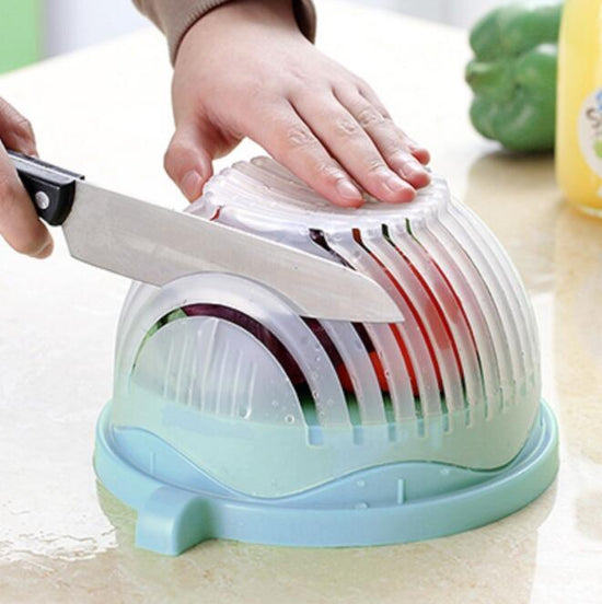 Creative Salad Cutter Fruit and Vegetable Cutter $37.28 Dana Fashion Color: Blue Dana's Kitchen Overview： Texture: Environmental protection, portable, thermal insulation, ultra-light, portable, heat collecting, filtering, dual-purpose, windproof, split ty