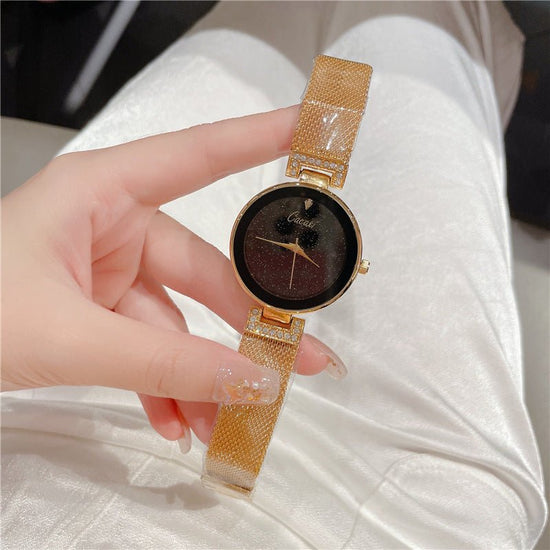 Creative Starry Sky Mesh Belt Waterproof Quartz Watch $38.93 Dana Fashion Color: Gold Women's Accessories Product information: Color: gold, silver, rose gold Thickness: 9mm Packing specification: Bubble Bag Applicable people: Female Style: Fashion Packing