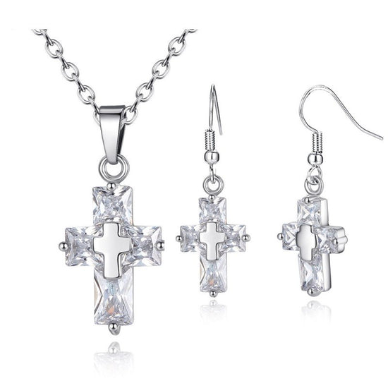 Cross ornament set $25.99 Dana Fashion Color: Sliver Beauty Tools Name: Cross Set Material: raw material is copper, surface plating treatment Color: gold, silver Size: Pendant: 1.2 * 2.2cm, Studs: 3.3 * 1.2 cm