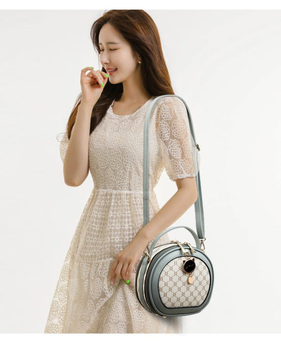 Crossbody Portable Printed Small Round Bag Soft Leather $44.52 Dana Fashion Color: Bear White Women's shoes Product information: Applicable scenarios: Daily matching Color: TMK Brown, rhombus White, bear White, Diamond Blue, MX Brown Material: PU Style: U