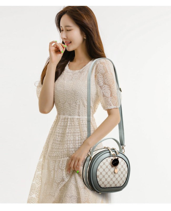 Crossbody Portable Printed Small Round Bag Soft Leather $44.52 Dana Fashion Color: Bear White Women's shoes Product information: Applicable scenarios: Daily matching Color: TMK Brown, rhombus White, bear White, Diamond Blue, MX Brown Material: PU Style: U