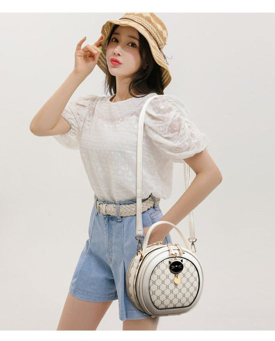 Crossbody Portable Printed Small Round Bag Soft Leather $44.52 Dana Fashion Color: Bear White Women's shoes Product information: Applicable scenarios: Daily matching Color: TMK Brown, rhombus White, bear White, Diamond Blue, MX Brown Material: PU Style: U