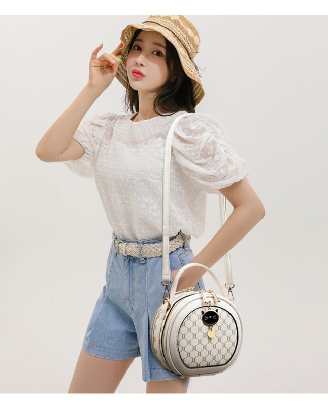 Crossbody Portable Printed Small Round Bag Soft Leather $44.52 Dana Fashion Color: Bear White Women's shoes Product information: Applicable scenarios: Daily matching Color: TMK Brown, rhombus White, bear White, Diamond Blue, MX Brown Material: PU Style: U