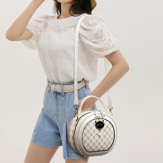 Crossbody Portable Printed Small Round Bag Soft Leather $44.52 Dana Fashion Color: Bear White Women's shoes Product information: Applicable scenarios: Daily matching Color: TMK Brown, rhombus White, bear White, Diamond Blue, MX Brown Material: PU Style: U