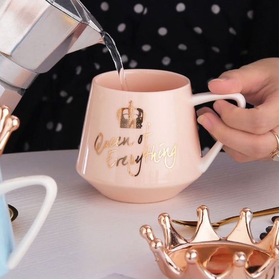 Crown Creative Mug $53.91 Dana Fashion Color: Blue Dana's Kitchen Characteristics: The mug of mugs with the Christmas theme, the material is ceramic and wooden. Special process for making cup, can see the logo inside the cup. Non-slip handle, can save hot