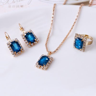 Crystal bridal necklace earring ring three piece set $25.00 Dana Fashion Color: Black Women's Accessories Setting material: alloy inlaid artificial gems / semi-precious stones Circumference 51cm (inclusive)-80cm (inclusive) Extension chain below 10cm Pend