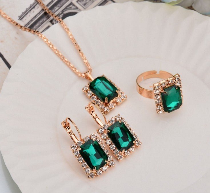 Crystal bridal necklace earring ring three piece set $25.00 Dana Fashion Color: Green Women's Accessories Setting material: alloy inlaid artificial gems / semi-precious stones Circumference 51cm (inclusive)-80cm (inclusive) Extension chain below 10cm Pend