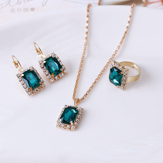Crystal bridal necklace earring ring three piece set $25.00 Dana Fashion Color: Lake blue Women's Accessories Setting material: alloy inlaid artificial gems / semi-precious stones Circumference 51cm (inclusive)-80cm (inclusive) Extension chain below 10cm