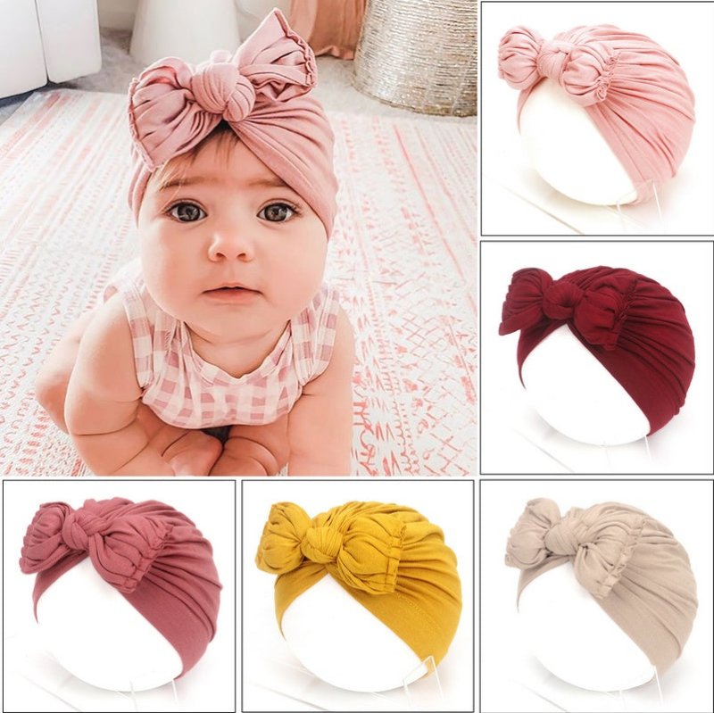 Cute Baby Hat Newborn Soft Baby Girl Hat Turban Infant Toddler Baby Cap Bonnet Headwraps $21.41 Dana Fashion Size: 35 to 48 Color: Black Baby Clothing Overview: Made from a soft knitted fabric, stretch and very comfortable to wear. A wide range of solid c