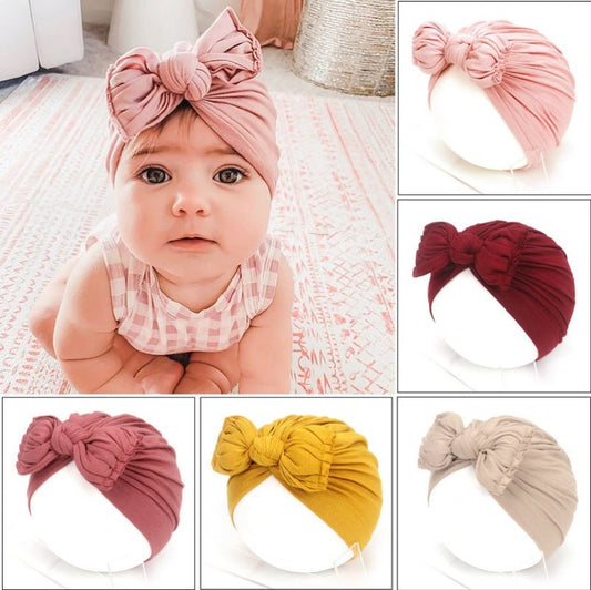 Cute Baby Hat Newborn Soft Baby Girl Hat Turban Infant Toddler Baby Cap Bonnet Headwraps $21.41 Dana Fashion Size: 35 to 48 Color: Black Baby Clothing Overview: Made from a soft knitted fabric, stretch and very comfortable to wear. A wide range of solid c