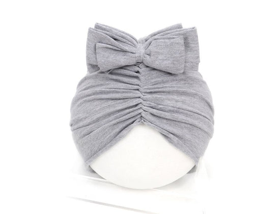 Cute Baby Hat Newborn Soft Baby Girl Hat Turban Infant Toddler Baby Cap Bonnet Headwraps $21.41 Dana Fashion Size: 35 to 48 Color: Grey Baby Clothing Overview: Made from a soft knitted fabric, stretch and very comfortable to wear. A wide range of solid ca