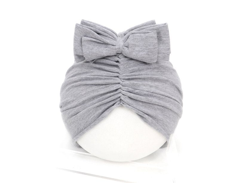 Cute Baby Hat Newborn Soft Baby Girl Hat Turban Infant Toddler Baby Cap Bonnet Headwraps $21.41 Dana Fashion Size: 35 to 48 Color: Grey Baby Clothing Overview: Made from a soft knitted fabric, stretch and very comfortable to wear. A wide range of solid ca