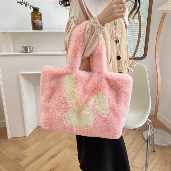 Cute Cartoon Rabbit Ears Plush Bag Autumn And Winter Shoulder Bag Shopping Handbags Large Capacity Personalized Tote Bags For Women $39.98 Dana Fashion Color: Pink Women's Bags Product information: Material: plush Style: fashionable and simple Features:So