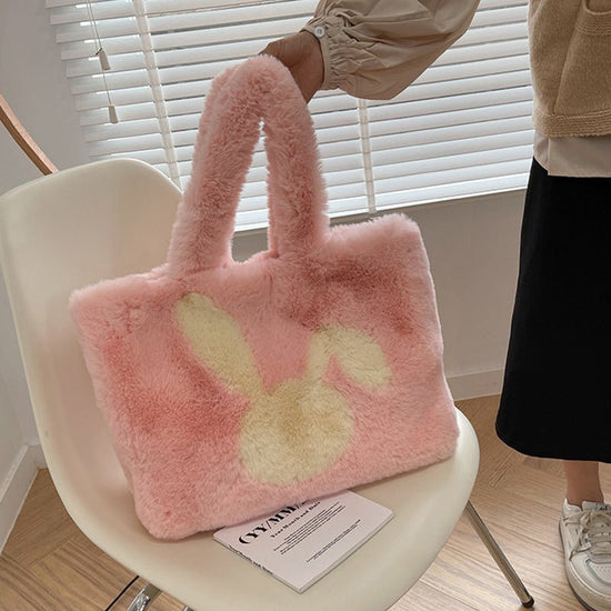 Cute Cartoon Rabbit Ears Plush Bag Autumn And Winter Shoulder Bag Shopping Handbags Large Capacity Personalized Tote Bags For Women $39.98 Dana Fashion Color: Beige Women's Bags Product information: Material: plush Style: fashionable and simple Features:S