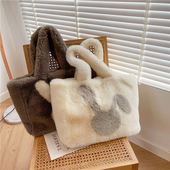 Cute Cartoon Rabbit Ears Plush Bag Autumn And Winter Shoulder Bag Shopping Handbags Large Capacity Personalized Tote Bags For Women $39.98 Dana Fashion Color: Beige Women's Bags Product information: Material: plush Style: fashionable and simple Features:S