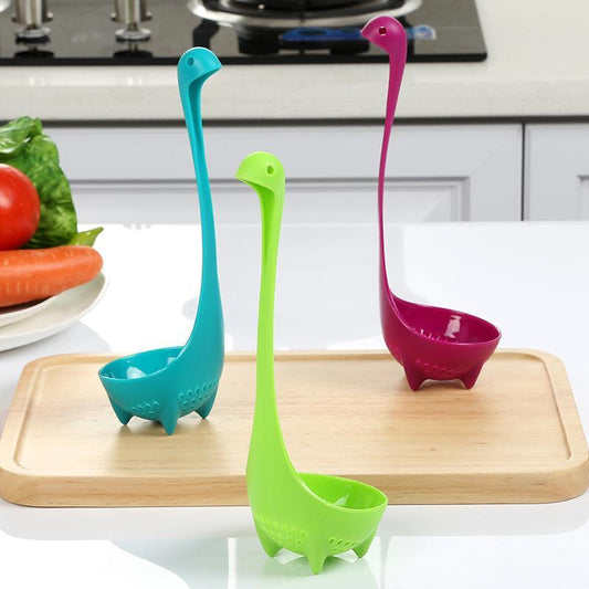 Cute Dinosaur Standing Spoon $19.00 Dana Fashion Color: 3 colour style: With packaging Dana's Kitchen Features: Brand new and high quality. Durable food grade PP material. Cute cartoon dinosaur design. Description: Production:Dinnerware Size: 8*8*24cm Mat