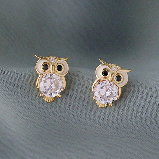 Cute With Diamonds Zircon Owl Stud Earrings For Women $20.00 Dana Fashion Color: E1897 Gold Women's Accessories Product information: Color: E1897 gold Material: Copper Modeling: animal/Zodiac Popular elements: Owl Style: Cartoon Packing list: Earrings*1 p