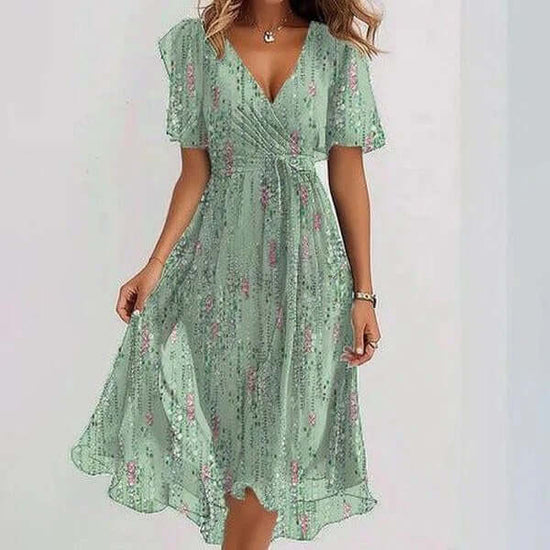 Chiffon Printed Short Sleeve Dress Summer Elegant V-neck Dresses Womens Clothing $43.57 Dana Fashion Color: Green flower Size: 3XL Women's clothing Overview: Unique design, stylish and beautiful. Good material, comfortable wear. A variety of colors, any c