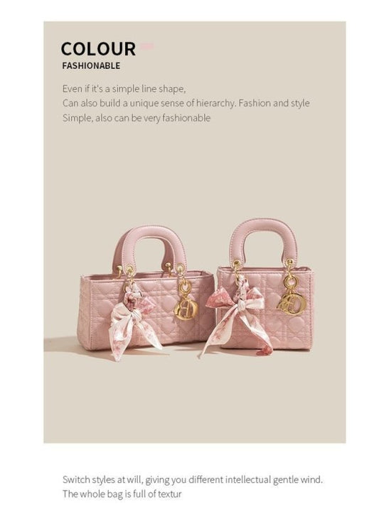 Denim Handbag Women's New Korean-style Fashion Shoulder Niche Texture Rhombus Crossbody Tote Bag $45.50 Dana Fashion Color Style: Pink Large Horizontal Size: Free Size Women's Bags Product information: Lining text: Polyester Applicable scenarios: Daily ma