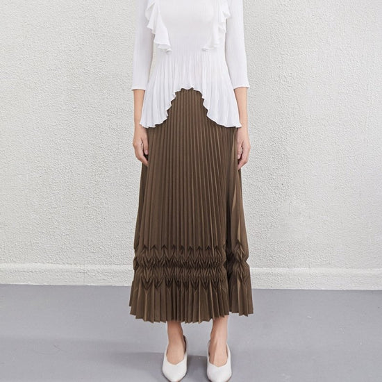 Design Sense Niche Three-dimensional Pleated Skirt $89.50 Dana Fashion Color: Brown Size: Average Size Women's clothing Product information: Color: black, white, gray, brown Elastic: medium elastic Main fabric composition: Polyester (polyester fiber) Size