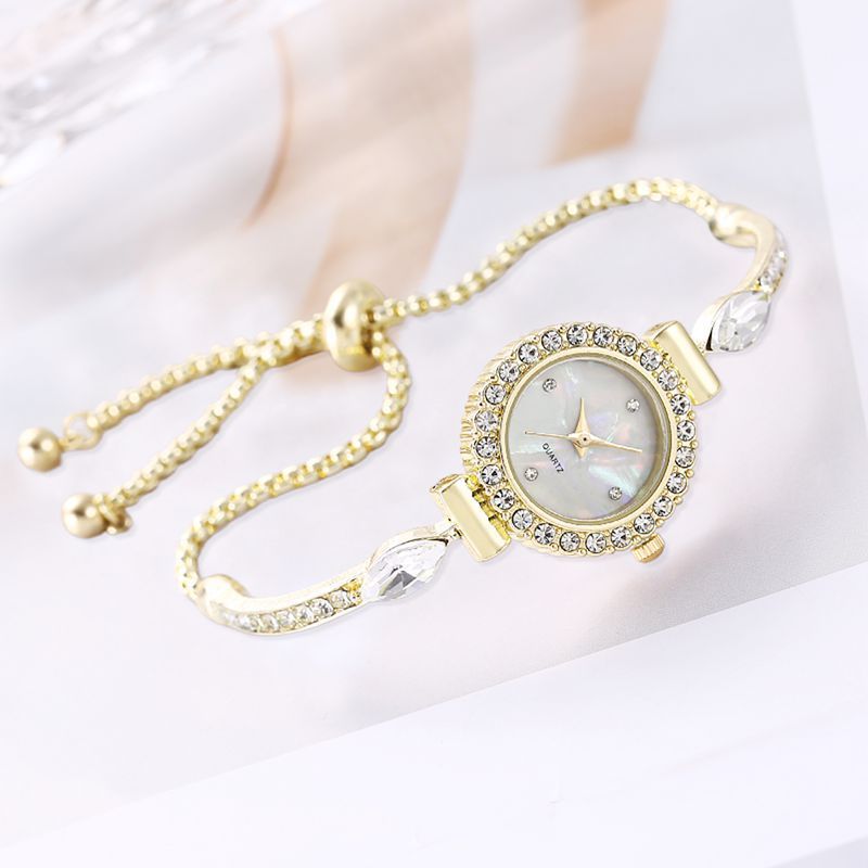 Diamond Dial Decorative Pull-out Bracelet Watch $19.00 Dana Fashion Color: Gold Women's Accessories Product information: Color: rose gold, gold, silver Waterproof: no Movement type: Quartz Mirror material: ordinary glass mirror Buckle style: single foldin