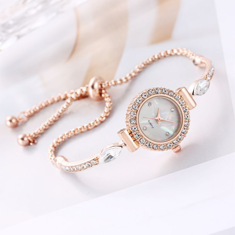 Diamond Dial Decorative Pull-out Bracelet Watch $19.00 Dana Fashion Color: Rose Gold Women's Accessories Product information: Color: rose gold, gold, silver Waterproof: no Movement type: Quartz Mirror material: ordinary glass mirror Buckle style: single f