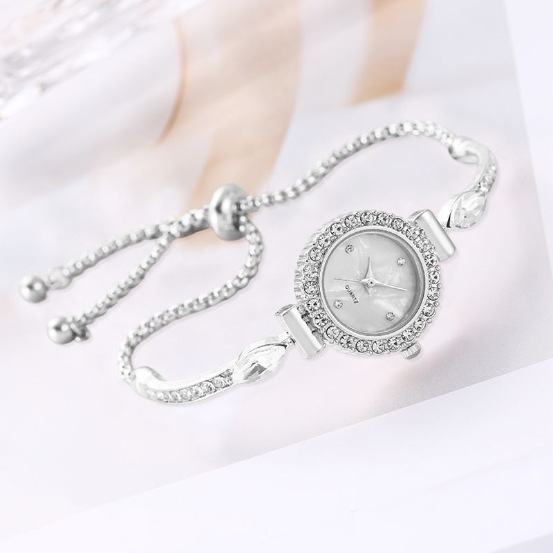 Diamond Dial Decorative Pull-out Bracelet Watch $19.00 Dana Fashion Color: Silver Women's Accessories Product information: Color: rose gold, gold, silver Waterproof: no Movement type: Quartz Mirror material: ordinary glass mirror Buckle style: single fold