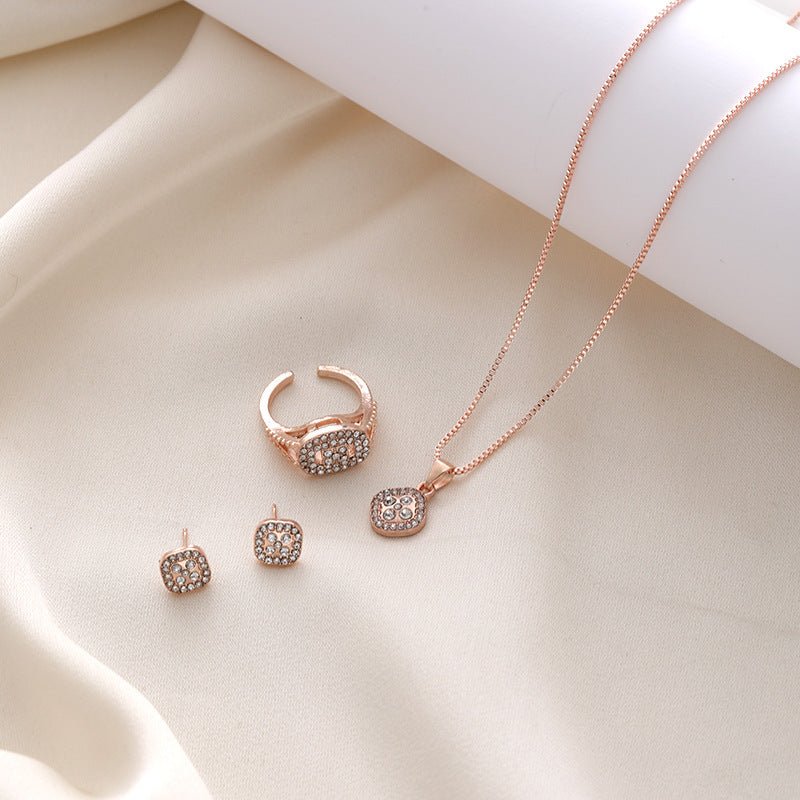 Diamond Geometric Necklace Ring Earrings 3-piece Set $15.50 Dana Fashion Color: CK0108 Rose Gold Women's Accessories Product information: Treatment Process: Electroplating Color: CK0106 Gold, CK0107 silver, CK0108 rose gold Applicable population: Female C