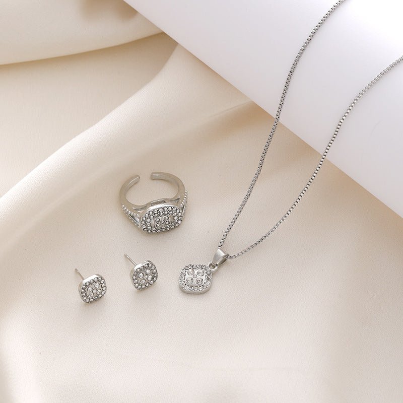 Diamond Geometric Necklace Ring Earrings 3-piece Set $15.50 Dana Fashion Color: CK0107 Silver Women's Accessories Product information: Treatment Process: Electroplating Color: CK0106 Gold, CK0107 silver, CK0108 rose gold Applicable population: Female Chai
