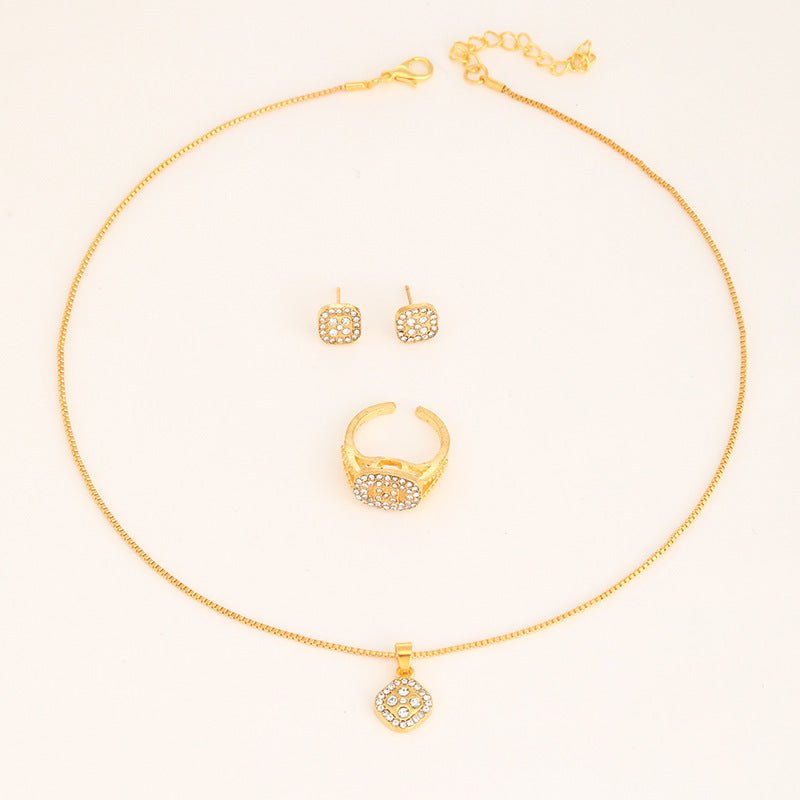 Diamond Geometric Necklace Ring Earrings 3-piece Set $15.50 Dana Fashion Color: CK0106 Gold Women's Accessories Product information: Treatment Process: Electroplating Color: CK0106 Gold, CK0107 silver, CK0108 rose gold Applicable population: Female Chain