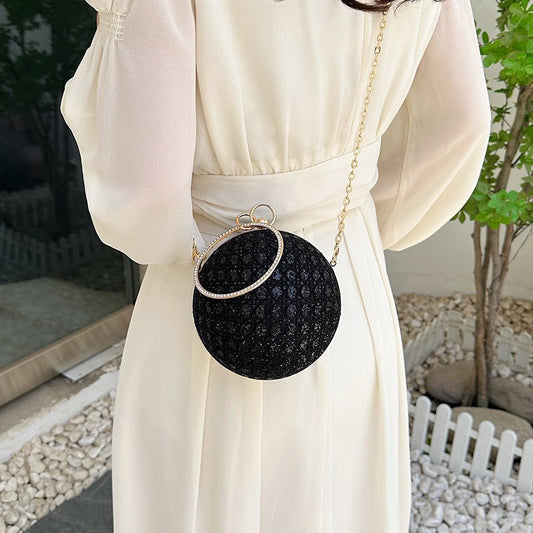 Diamond Retro Shoulder Bag Women's Crossbody Chain Ball Small Round Bag $35.04 Dana Fashion Color: Black Women's Bags Product information: Lining text: Polyester Applicable scenario: Daily competition Color: black, gold, silver, pink, white Outer bag type