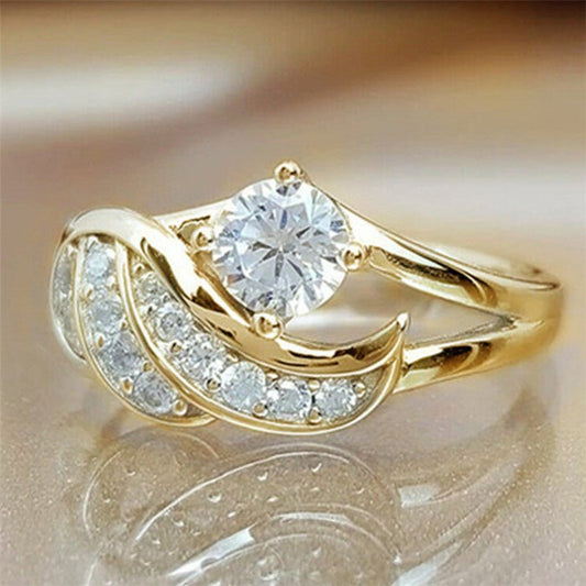 Diamond-studded Ring European And American Fashion Angel Wings $12.50 Dana Fashion Color: Gold Size: No 10 Women's Accessories Product information: Type: Ring Processing Technology: carving Color: gold, silver Size: no.5, no.6, no.7, no.8, no.9, no.10, no