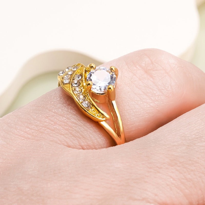 Diamond-studded Ring European And American Fashion Angel Wings $12.50 Dana Fashion Color: Gold Size: No 10 Women's Accessories Product information: Type: Ring Processing Technology: carving Color: gold, silver Size: no.5, no.6, no.7, no.8, no.9, no.10, no