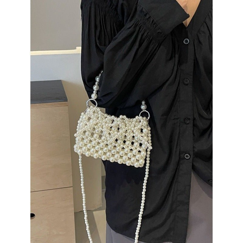 Dinner Luxury Pearl Women's Bag $40.73 Dana Fashion Color: Beige Women's Bags Product information: Lining texture: without lining Applicable scenarios: Daily matching Color: creamy-white, Silver Hardness: soft Material: acrylic Suitcase shape: Horizontal