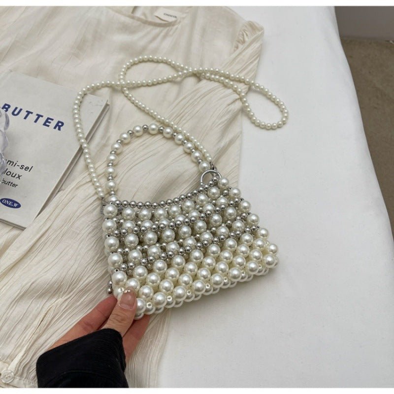 Dinner Luxury Pearl Women's Bag $40.73 Dana Fashion Color: Silver Women's Bags Product information: Lining texture: without lining Applicable scenarios: Daily matching Color: creamy-white, Silver Hardness: soft Material: acrylic Suitcase shape: Horizontal