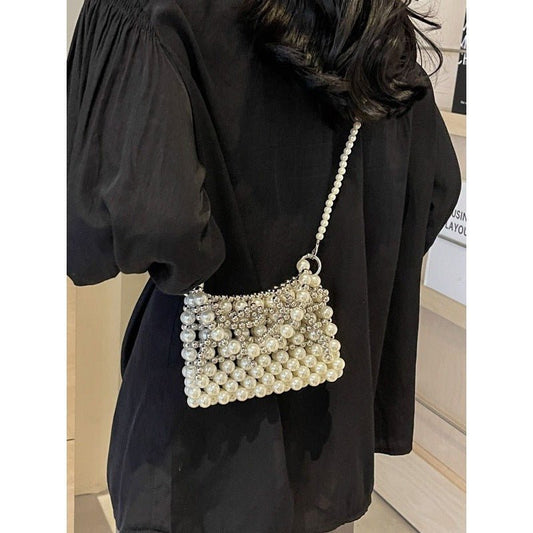 Dinner Luxury Pearl Women's Bag $40.73 Dana Fashion Color: Beige Women's Bags Product information: Lining texture: without lining Applicable scenarios: Daily matching Color: creamy-white, Silver Hardness: soft Material: acrylic Suitcase shape: Horizontal