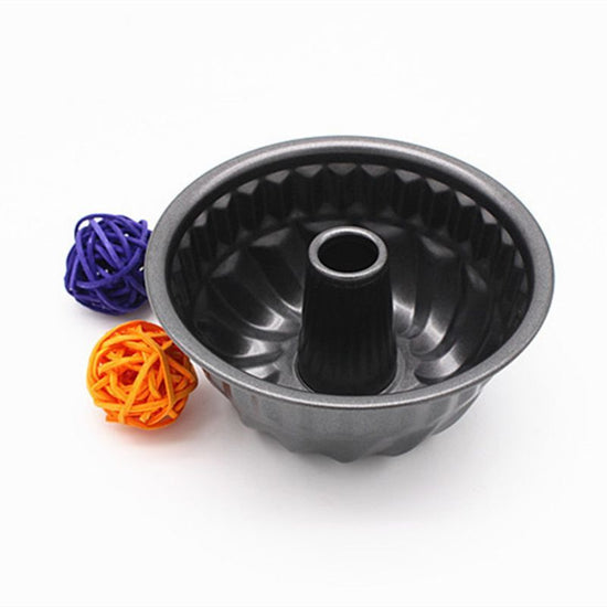 Doughnut baking mold $14.86 Dana Fashion Color: Black Size: L Dana's Kitchen Description: 100% brand new, high quality Features: As a result of the use of raised floor design, so it is easy to disassemble, easy to use, clean and concise, clean sanitation