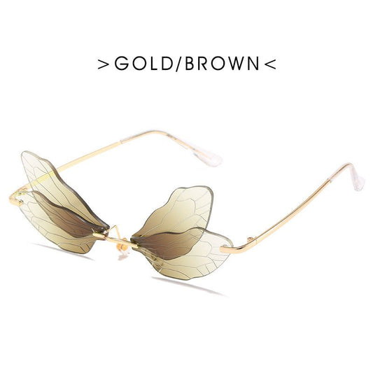 Dragonfly wings sunglasses $25.50 Dana Fashion Color: GLOD BROWN Women's Accessories Specification: Adult Glasses structure: frame Whether it is polarized: No Lens material: PC Style: personality Frame material: metal Anti-UV grade: UV400 Style: General V