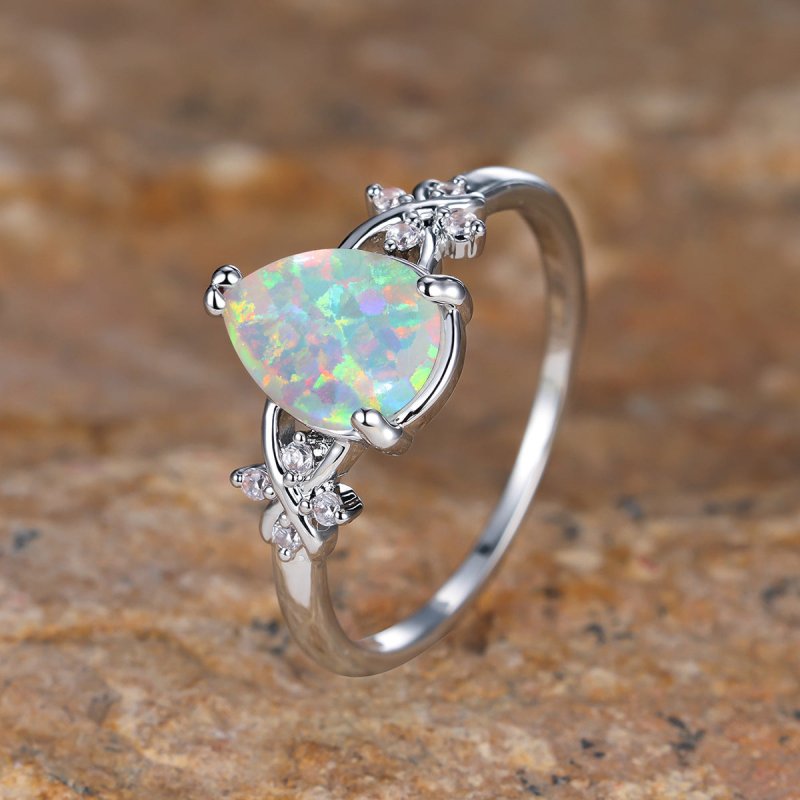 Drop-shaped Inlaid Zircon White Diamond Flower Ring Vintage Simple All Match Jewelry $19.00 Dana Fashion Color: Palladium White Size: No 10 Women's Accessories Product information: Type: Ring, ring Treatment Process: Diamond Color: Palladium White K albin