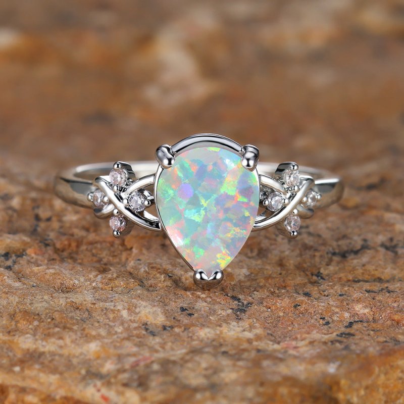 Drop-shaped Inlaid Zircon White Diamond Flower Ring Vintage Simple All Match Jewelry $19.00 Dana Fashion Color: Palladium White Size: No 10 Women's Accessories Product information: Type: Ring, ring Treatment Process: Diamond Color: Palladium White K albin