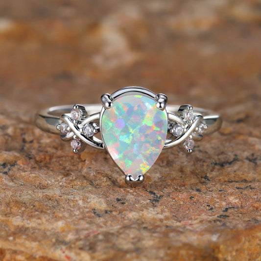Drop-shaped Inlaid Zircon White Diamond Flower Ring Vintage Simple All Match Jewelry $19.00 Dana Fashion Color: Palladium White Size: No 10 Women's Accessories Product information: Type: Ring, ring Treatment Process: Diamond Color: Palladium White K albin
