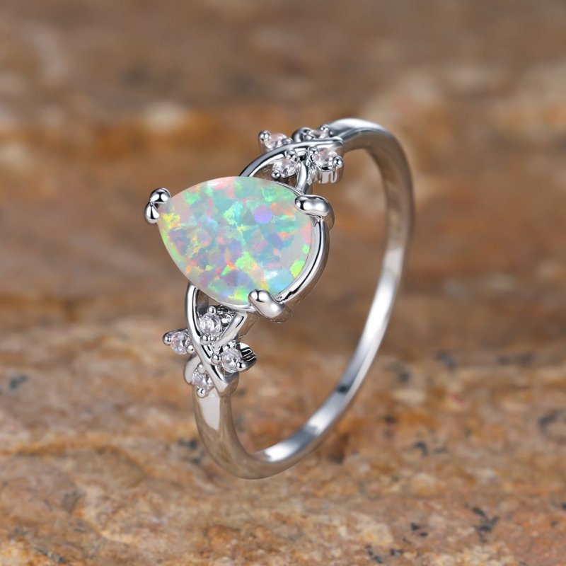 Drop-shaped Inlaid Zircon White Diamond Flower Ring Vintage Simple All Match Jewelry $19.00 Dana Fashion Color: Palladium White Size: No 10 Women's Accessories Product information: Type: Ring, ring Treatment Process: Diamond Color: Palladium White K albin