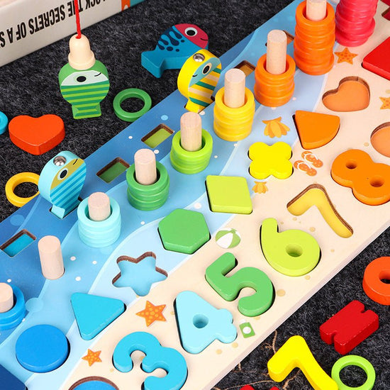 Educational Wooden Toys for Kids Board Math Fishing Count Numbers Matching Digital Shape Match Early Education Toy $51.28 Dana Fashion Color: 5 in 1 set Toys & Hobbies Overview： Five in One Number Board Let the baby have a colorful and happy childhood Ear