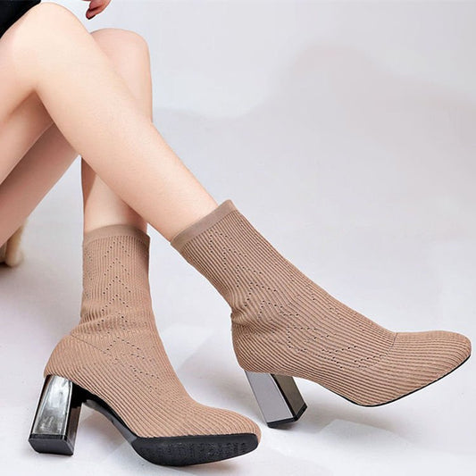 Elastic boots women high heels $55.90 Dana Fashion Color: Black Size: 34 Women's shoes Brand: other/other Closed way: sleeve Size: 34 35 36 37 38 39 40 Style: European and American Tube height: short tube Popular elements: mesh Heel height: flat heel (les