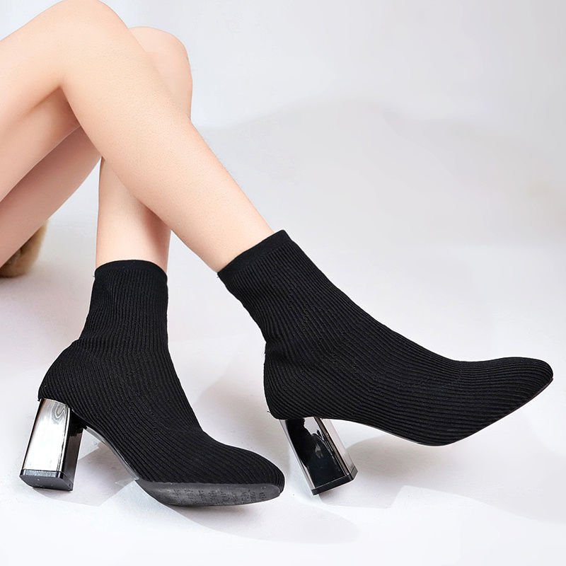 Elastic boots women high heels $55.90 Dana Fashion Color: Black Size: 34 Women's shoes Brand: other/other Closed way: sleeve Size: 34 35 36 37 38 39 40 Style: European and American Tube height: short tube Popular elements: mesh Heel height: flat heel (les