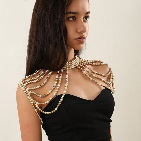 Elegant Multi-layer Tassel Imitation Pearl Shoulder Chain Women's $49.00 Dana Fashion Color: 04 Mixed Color 1607 Women's Accessories Product information: Processing Technology: handmade beads Type: eyebrow ring Color: 01 Gold White 1599,02 White 1603,02 m
