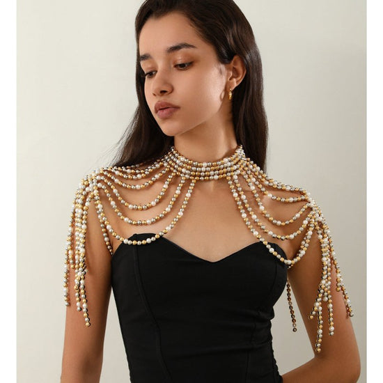 Elegant Multi-layer Tassel Imitation Pearl Shoulder Chain Women's $49.00 Dana Fashion Color: 02 Mixed Color 1603 Women's Accessories Product information: Processing Technology: handmade beads Type: eyebrow ring Color: 01 Gold White 1599,02 White 1603,02 m