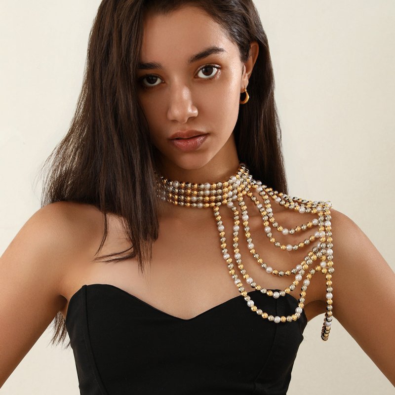 Elegant Multi-layer Tassel Imitation Pearl Shoulder Chain Women's $49.00 Dana Fashion Color: 01 Gold White 1599 Women's Accessories Product information: Processing Technology: handmade beads Type: eyebrow ring Color: 01 Gold White 1599,02 White 1603,02 mi