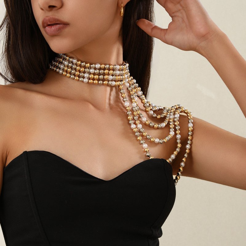Elegant Multi-layer Tassel Imitation Pearl Shoulder Chain Women's $49.00 Dana Fashion Color: 03 Mixed Color 1606 Women's Accessories Product information: Processing Technology: handmade beads Type: eyebrow ring Color: 01 Gold White 1599,02 White 1603,02 m